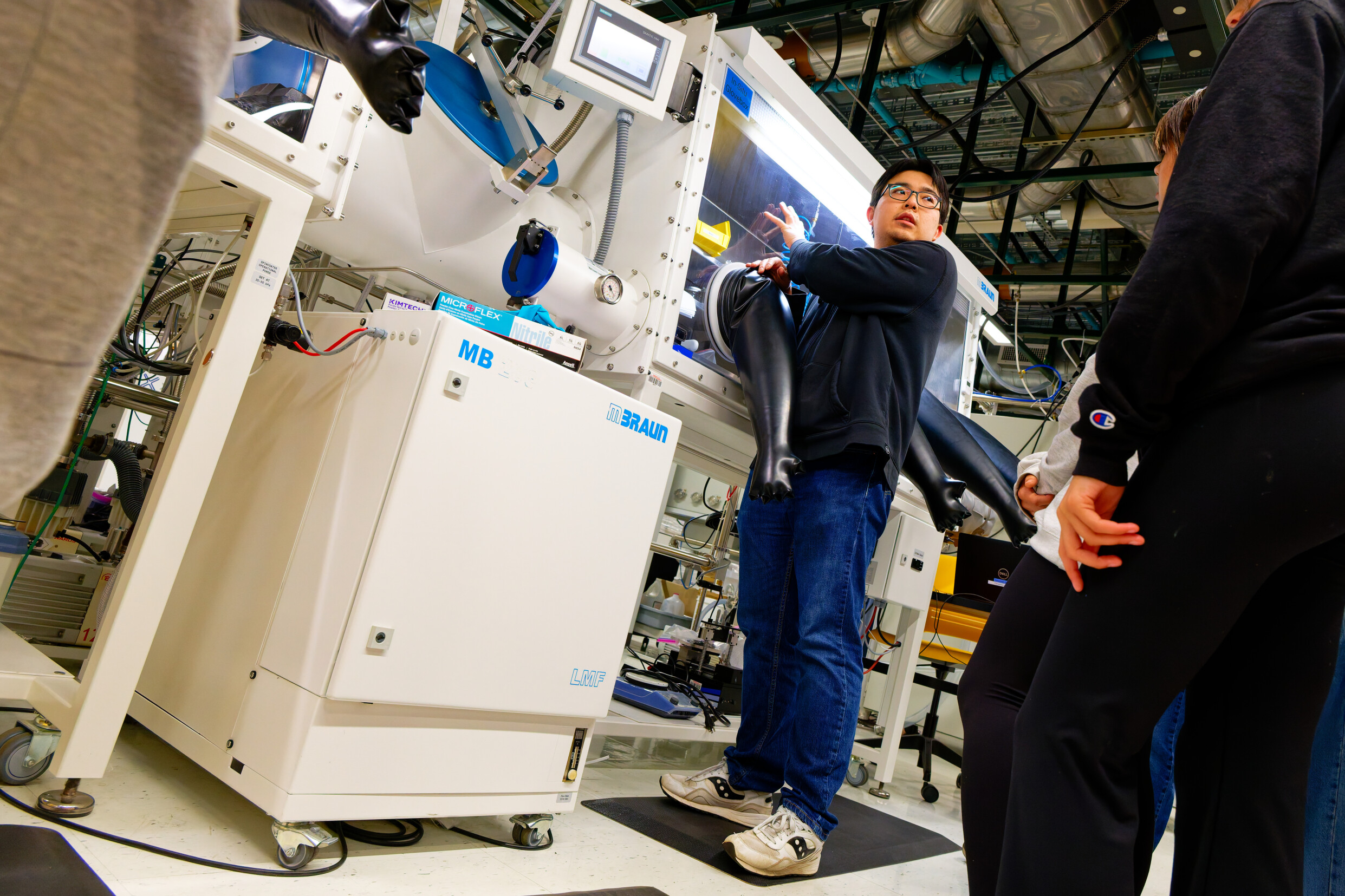 Students learn about a glove box